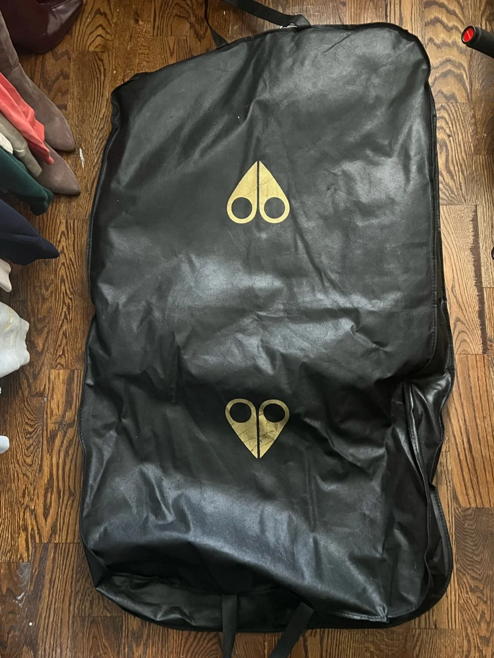 Moose Knuckles Black Winter Jacket with Gold Fur Trim And Accents